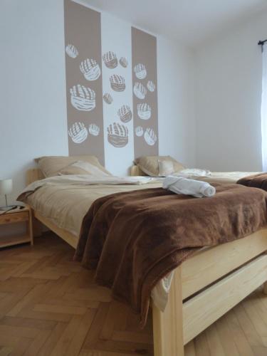 Katil atau katil-katil dalam bilik di Pogácsás Apartman