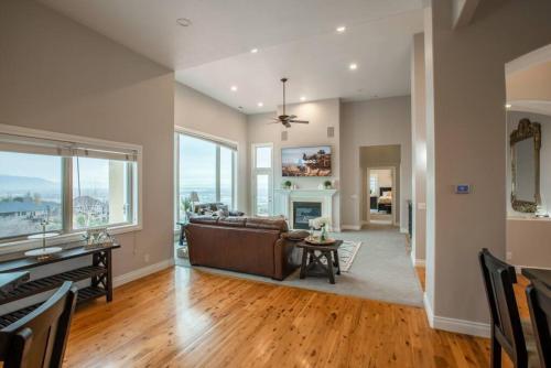 a living room with a couch and a fireplace at Scenic Hills in North Salt Lake