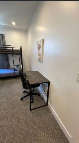 a room with a desk and a bunk bed at Navien Nooks Unit 3 in Salt Lake City