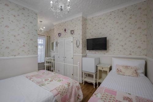 Katil atau katil-katil dalam bilik di The Wescoe Guesthouse