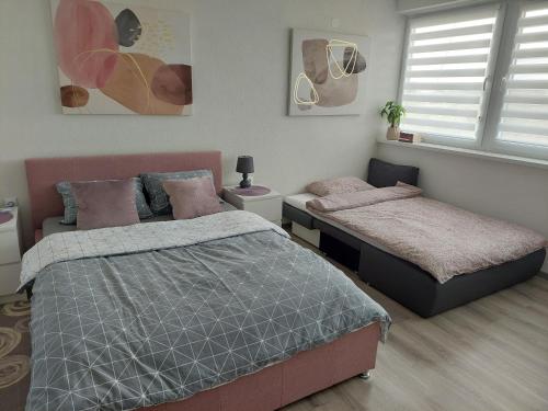 Llit o llits en una habitació de Studio apartman TARA