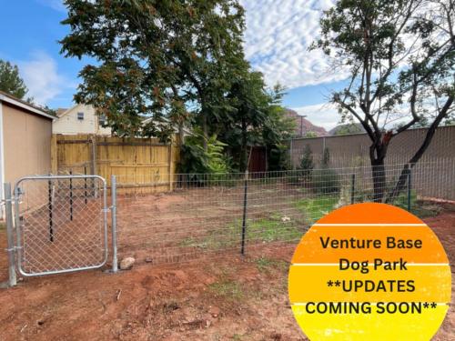 a dog park with a fence and a sign at Lake House Escape, Venture Base Unit 7 in Kanab