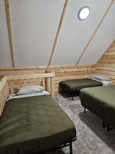 Postel nebo postele na pokoji v ubytování Halibut Haven, Cabin 7 at Lower Kenai Lodge