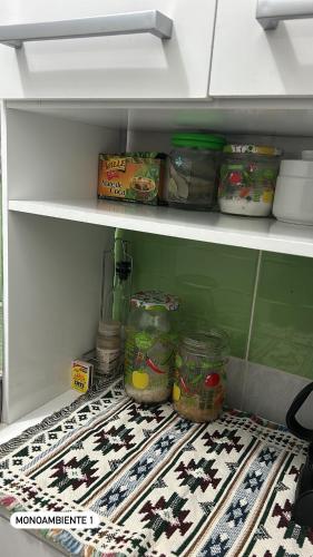 an open refrigerator with some food inside of it at El Viejo Roble in Cusco