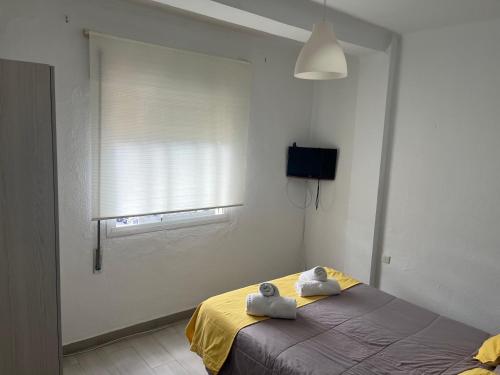 Ένα ή περισσότερα κρεβάτια σε δωμάτιο στο APARTAMENTO Maro EN EL CENTRO DE RONDA