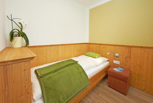 Katil atau katil-katil dalam bilik di Comfort Hotel Garni Landhaus Gitti