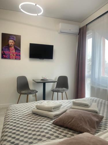 TV a/nebo společenská místnost v ubytování Hotel Femina
