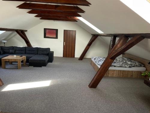 Posezení v ubytování Apartmán pod Kňeží Horou