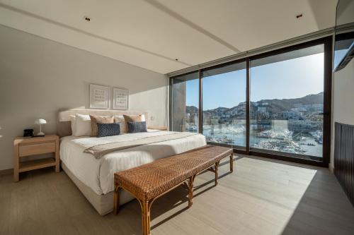 Postel nebo postele na pokoji v ubytování Paraiso Residences Marina Cabo by Capitalia