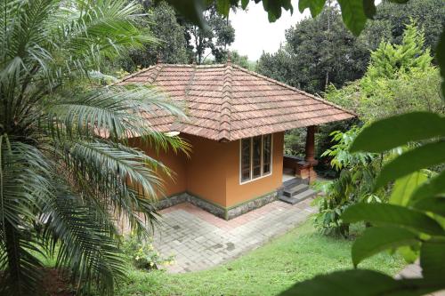 Zahrada ubytování Indeevara Luxury Resort and Spa, Wayanad