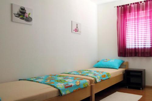 Posteľ alebo postele v izbe v ubytovaní Apartment Sol