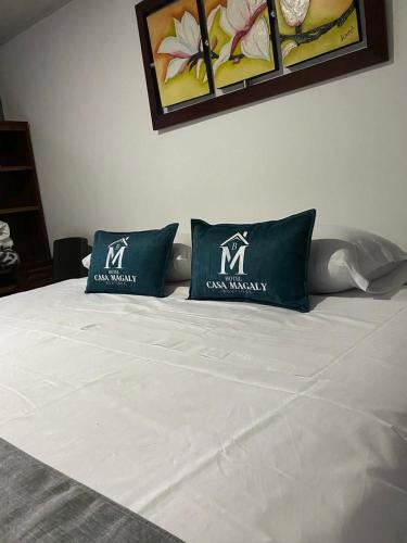 Кровать или кровати в номере Hotel Boutique Casa Magaly