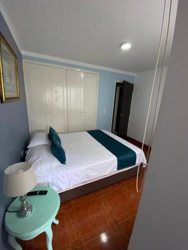 Кровать или кровати в номере Hotel Boutique Casa Magaly