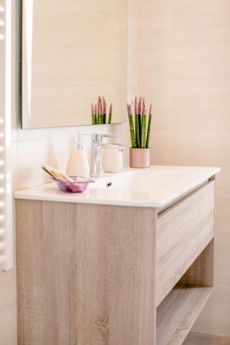 a bathroom with a sink and a mirror at BLU MARINE in Catanzaro