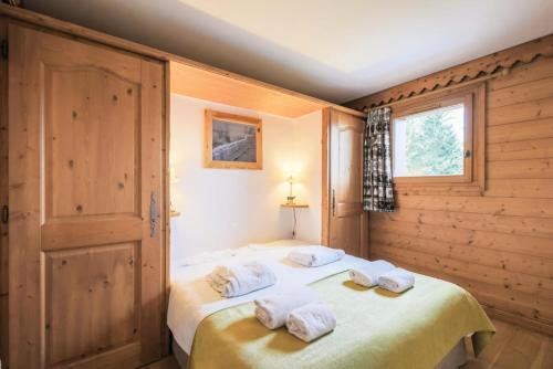Posteľ alebo postele v izbe v ubytovaní Résidence Le Roselend - maeva Home - Appartement au pied des pistes 3 Pièces 6 Personnes - Sélection MAE-4663