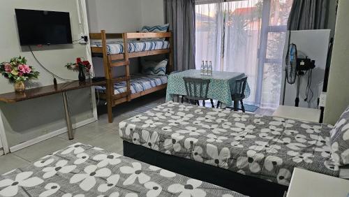 Katil atau katil-katil dalam bilik di Zufike Self Catering