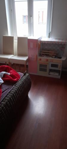 Katil atau katil-katil dalam bilik di Doppelbett Zimmer in mulhouse Centre