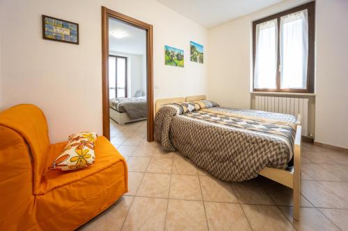 Ένα ή περισσότερα κρεβάτια σε δωμάτιο στο CASA VACANZE DIONIGI