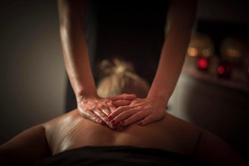 a woman with her hands on her back at Lido Townhouse in Bristol