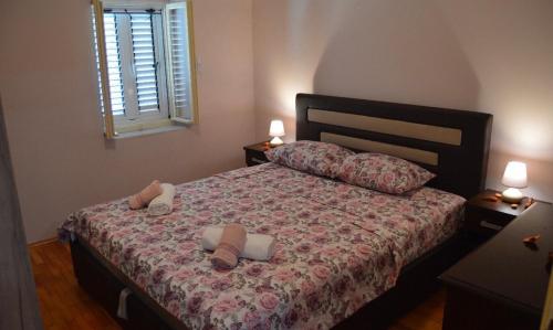 Una cama o camas en una habitación de Iva apartment