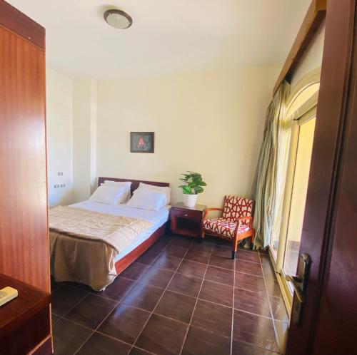 En eller flere senge i et værelse på Tamra Residence Apartment Families and Couples Only