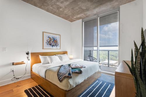 Postel nebo postele na pokoji v ubytování Austin Condo Hotel