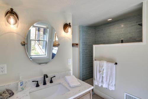 a bathroom with a sink and a mirror at Colorado Mountain Getaway about 12 Mi to Buena Vista! in Nathrop