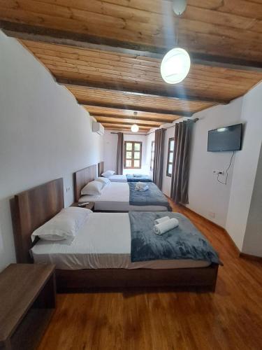 Postel nebo postele na pokoji v ubytování Hotel Demaj