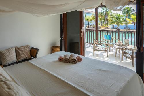 Ένα ή περισσότερα κρεβάτια σε δωμάτιο στο Watervilla Blou Bonaire - Waterlands Village