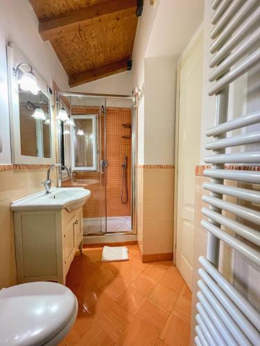 a bathroom with a sink and a shower at Putechella's Apartments in Maiori