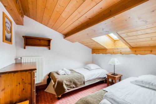 Posteľ alebo postele v izbe v ubytovaní Résidence Les Alpages de Chantel - maeva Home - Appartement duplex 3 Pièces 6 Personnes - Sélection MAE-1638