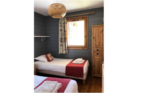 Postel nebo postele na pokoji v ubytování Résidence Les Alpages de Reberty - maeva Home - Appartement 3 pièces 6 pers 59