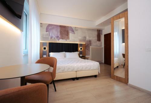 Postel nebo postele na pokoji v ubytování Hotel Everest