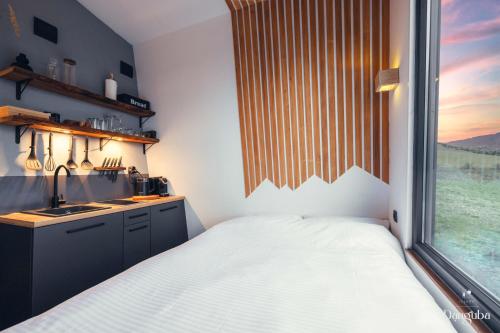 Postel nebo postele na pokoji v ubytování Tiny Glamp House – DANGUBA