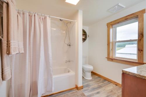 a bathroom with a shower and a toilet at Charming Biglerville Home with Patio and Yard! 