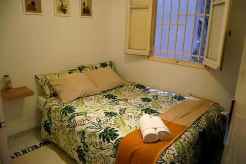 En eller flere senge i et værelse på Habitación céntrica