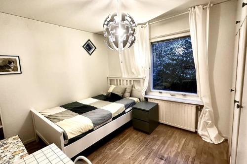 Кровать или кровати в номере The Royal home - Liseberg / Svenska Mässan