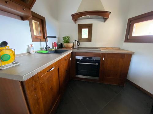 Kuchyň nebo kuchyňský kout v ubytování Casa Pramosio