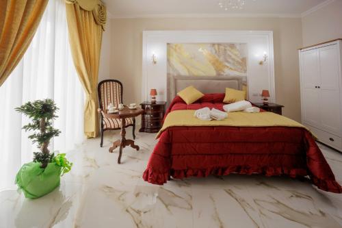Postel nebo postele na pokoji v ubytování REDDIMUS Guest House
