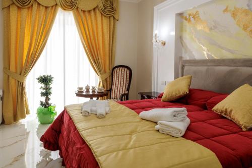 Postel nebo postele na pokoji v ubytování REDDIMUS Guest House