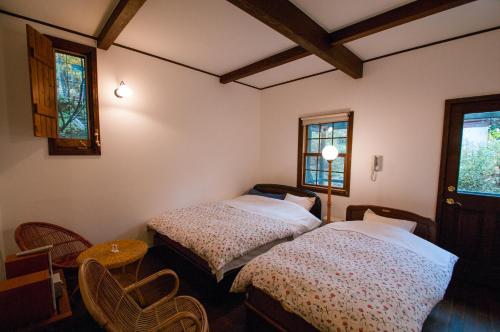 מיטה או מיטות בחדר ב-Tombouctou