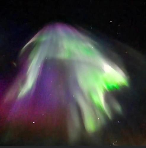 an image of the northern lights in the sky at Hótel Eyjafjallajökull in Hvolsvöllur