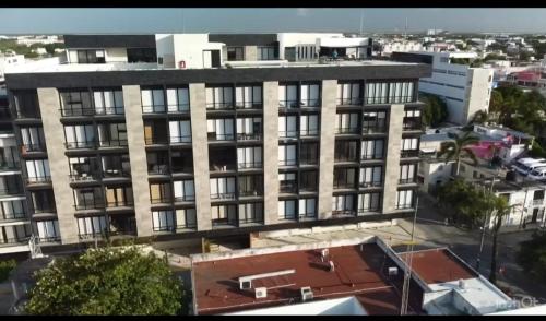 an overhead view of a large building in a city at Musa 318 in Playa del Carmen