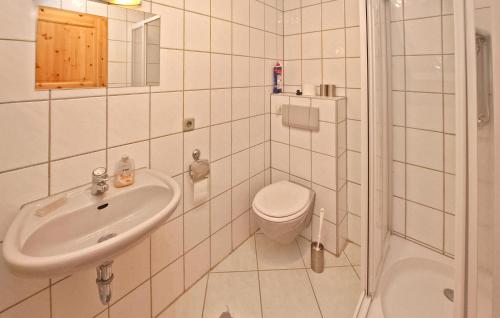 a bathroom with a toilet and a sink at 1 Bedroom Nice Apartment In Meiersberg in Meiersberg