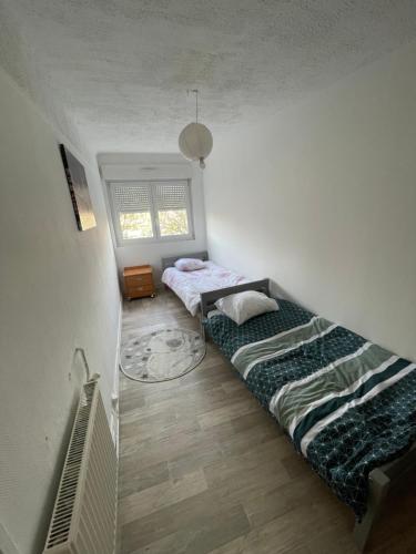 Postel nebo postele na pokoji v ubytování Appartement 2 chambres lumineux à 10 minutes de Paris