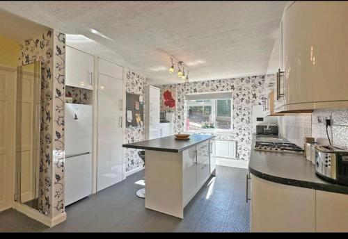 A cozinha ou cozinha compacta de Maidenhead house