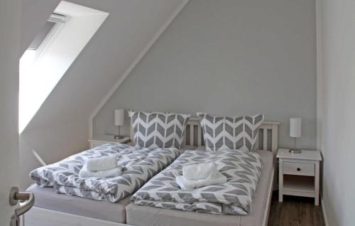 Ένα ή περισσότερα κρεβάτια σε δωμάτιο στο 2 Bedroom Nice Apartment In Usedom