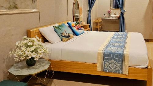 Кровать или кровати в номере Homestay Sala