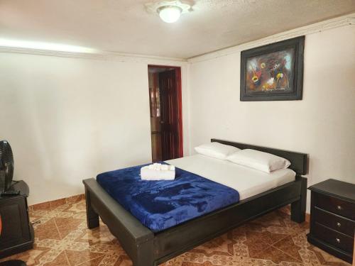 Cama ou camas em um quarto em Casa Hotel Venecia