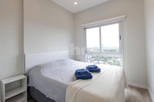 Postel nebo postele na pokoji v ubytování Comfortable Apt Close To Shopping Del Sol